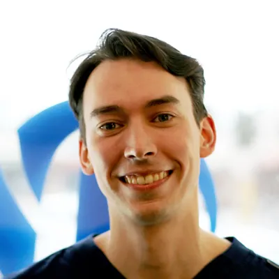 A headshot photo of Kyle, a massage therapist at Alpha Spine Health & Injury Center